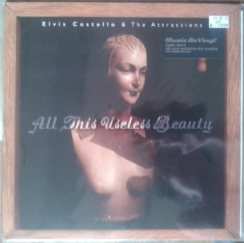 Elvis Costello & The Attractions - All This Useless Beauty (LP, Album, RE) (Near Mint (NM or M-))