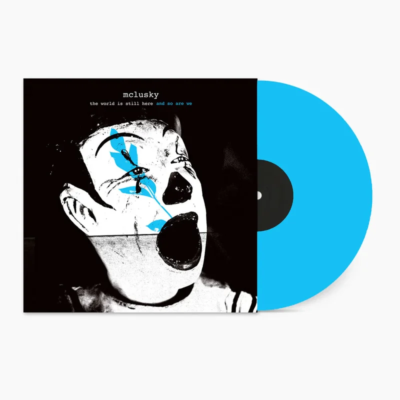 MCLUSKY THE WORLD IS STILL HERE AND SO ARE WE' LP (Blue Vinyl)